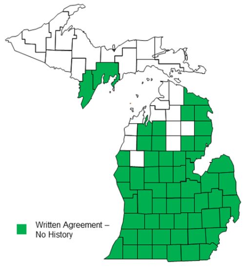 A map of Michigan counties featuring each county colored either green or white.