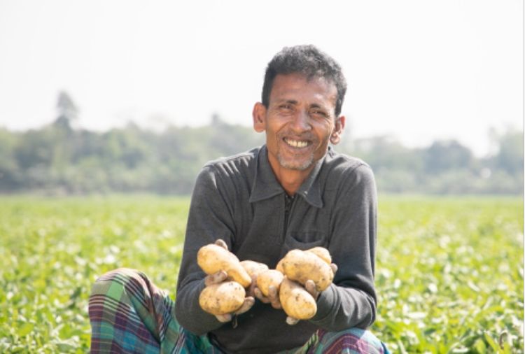 Man Holding Potatoes